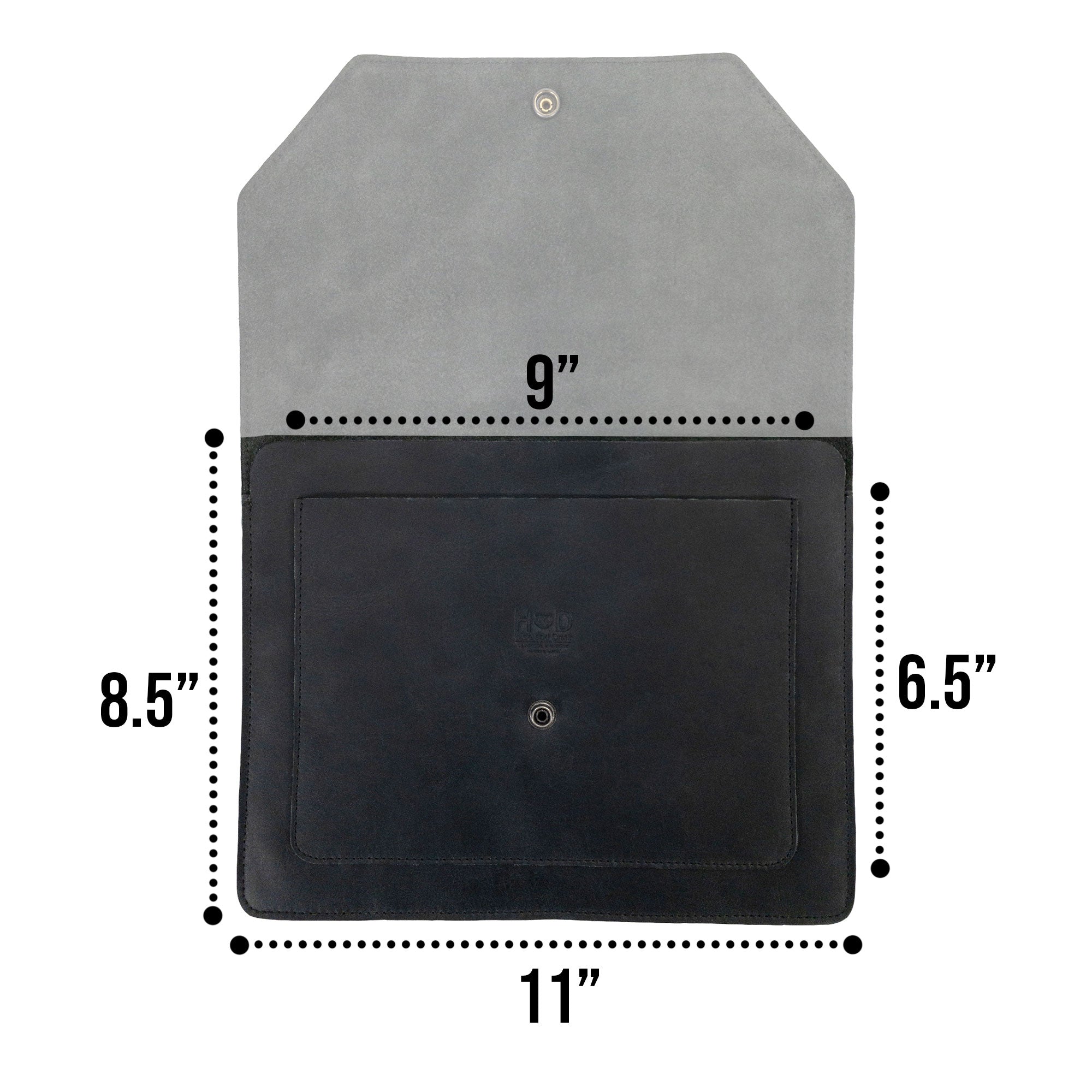 Hide & Drink's Slim Portfolio in black displaying additional items, emphasizing its utility as a handmade Flat Messenger Case. This Full Grain Leather Narrow Document Holder is ideal for organizing your essential office accessories, made in La Antigua Guatemala & Oaxaca Mexico.