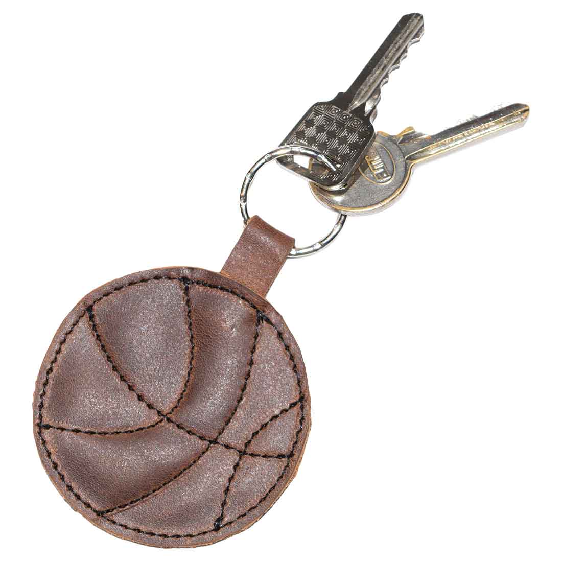 Basketball Keychain by Hide & Drink featuring a rustic full grain leather design attached to keys. Ideal for sports fans, this key ring makes a perfect gift for players. Handmade in La Antigua Guatemala & Oaxaca Mexico, showcasing small batch production and artisan craftsmanship.
