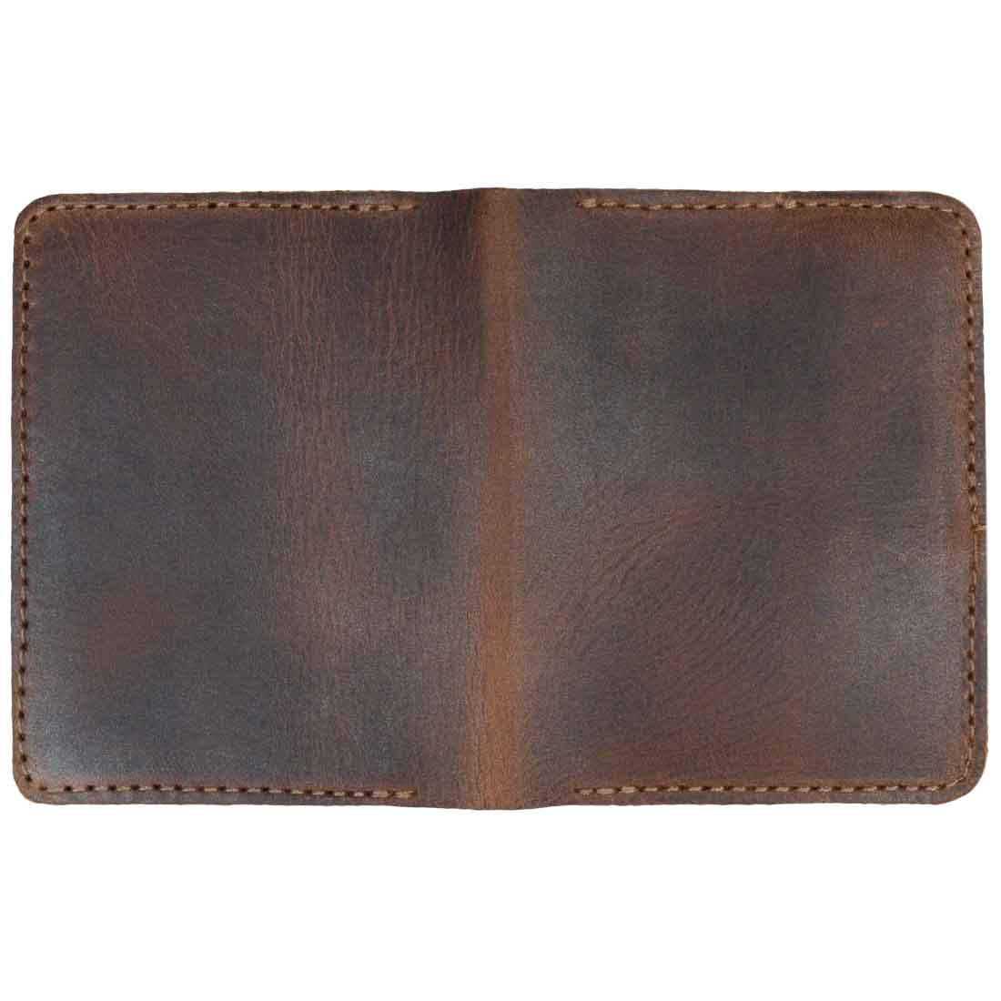 Empty inside of the Bi-Fold Card Wallet Diagonal by Hide & Drink, emphasizing its simple and elegant minimalist style made from full grain leather. This cash organizer showcases the quality of small batch production.