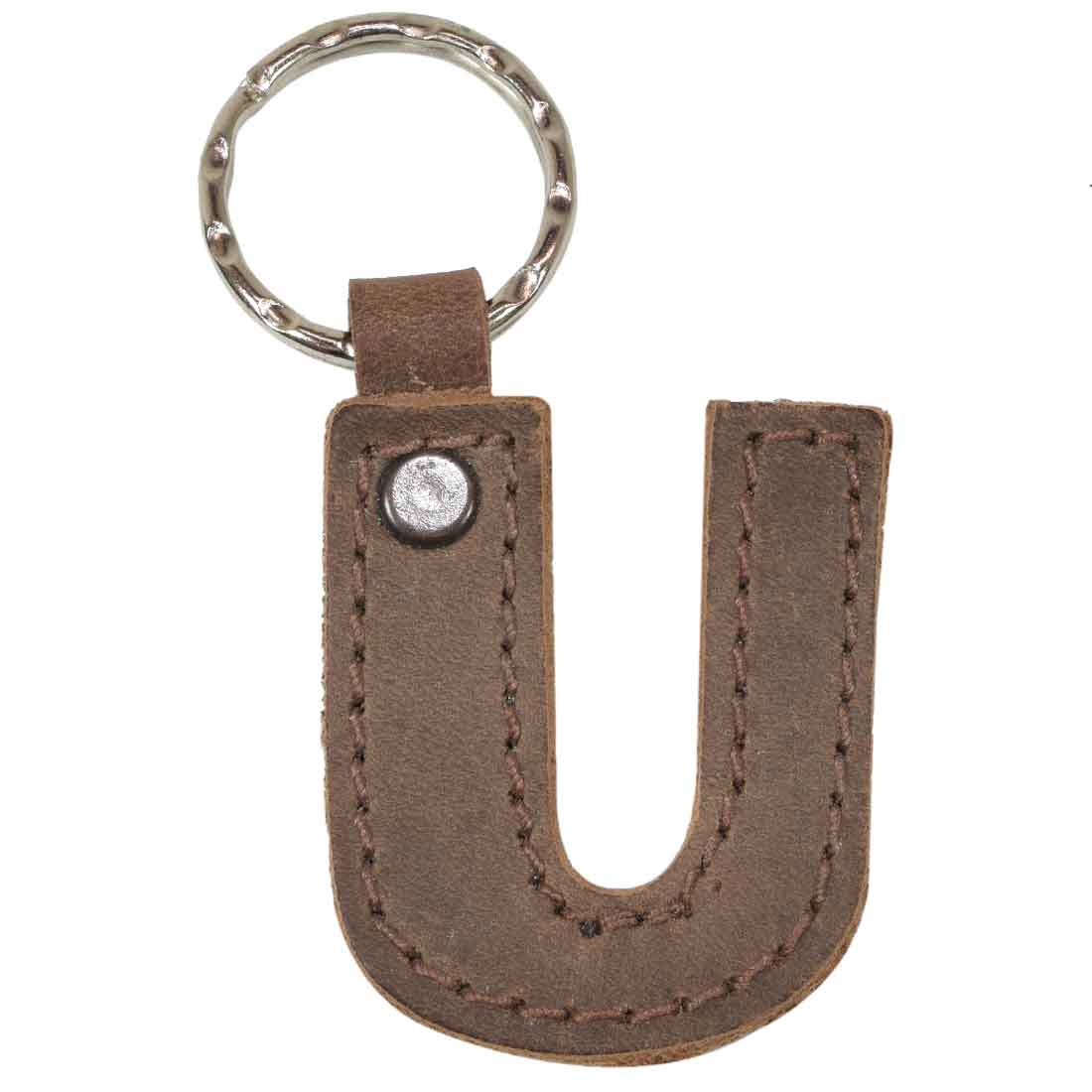 Letter U in a thick leather Alphabet Letter Keychain by Hide & Drink. This sturdy item crafted from Full Grain Leather showcases artisan quality and reflects small batch production methods from La Antigua Guatemala.