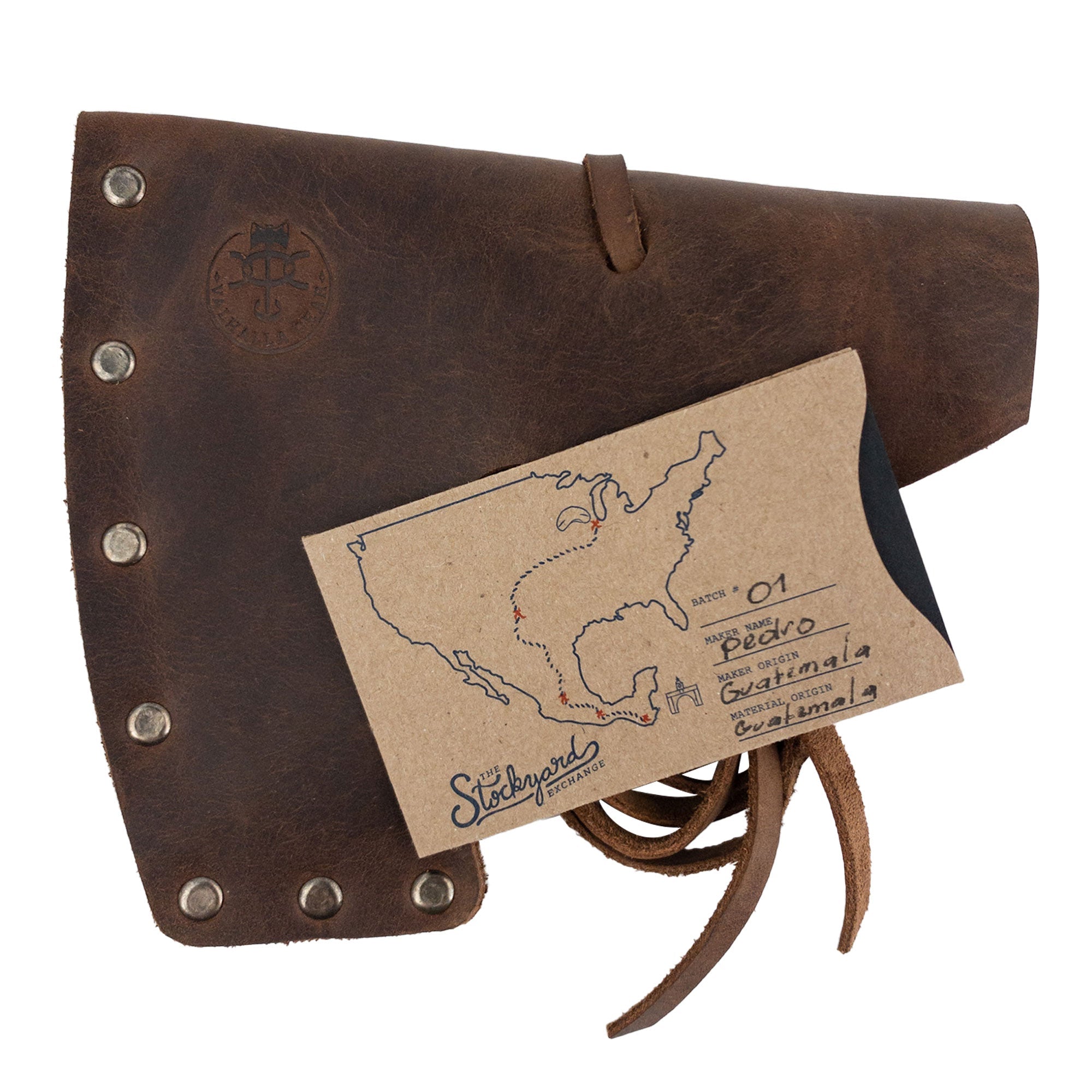Valhalla Gear's Bearded Axe Head Sheath with String neatly presented with a packaging card, reflecting its handmade origins. This Full Grain Leather Riveted Axe Head Sheath with String is not just a Protector Case but also an artisan's pride, crafted in La Antigua Guatemala & Oaxaca Mexico, highlighting StockyardX's commitment to quality and craftsmanship.