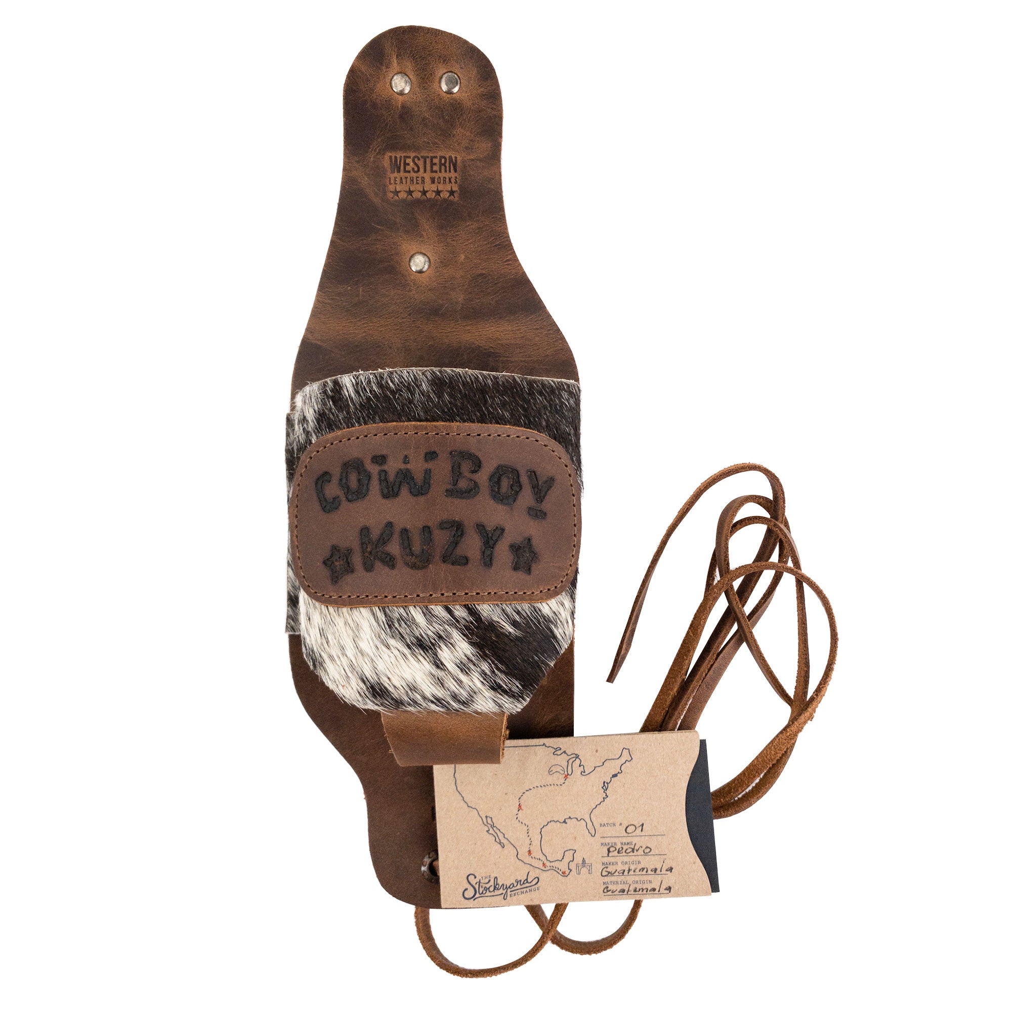 Presentation of the Cowboy Beer Holster by Western Leather Works alongside its packaging, underlining the attention to detail and craftsmanship. This handmade holder is perfect for handsfree enjoyment of beverages, made from full grain leather in La Antigua Guatemala & Oaxaca Mexico.