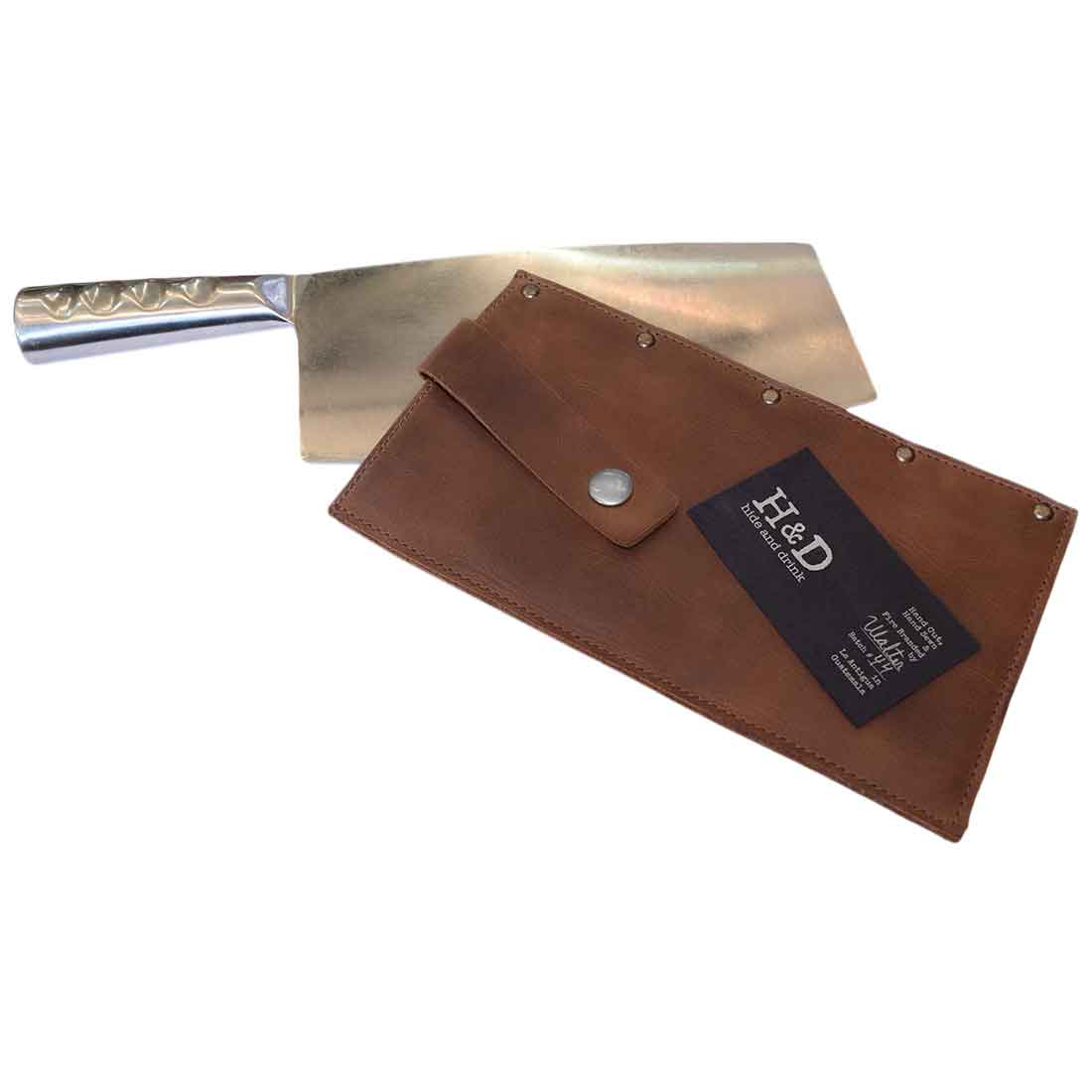 Hide & Drink Butcher Knife Holster paired with a cleaver, illustrating the protective qualities of this stylish full grain leather sheath. This handmade butcher knife holster is ideal for storing and showcasing your kitchen essentials, underlining the artisan craftsmanship that embodies small batch production in La Antigua Guatemala & Oaxaca Mexico.