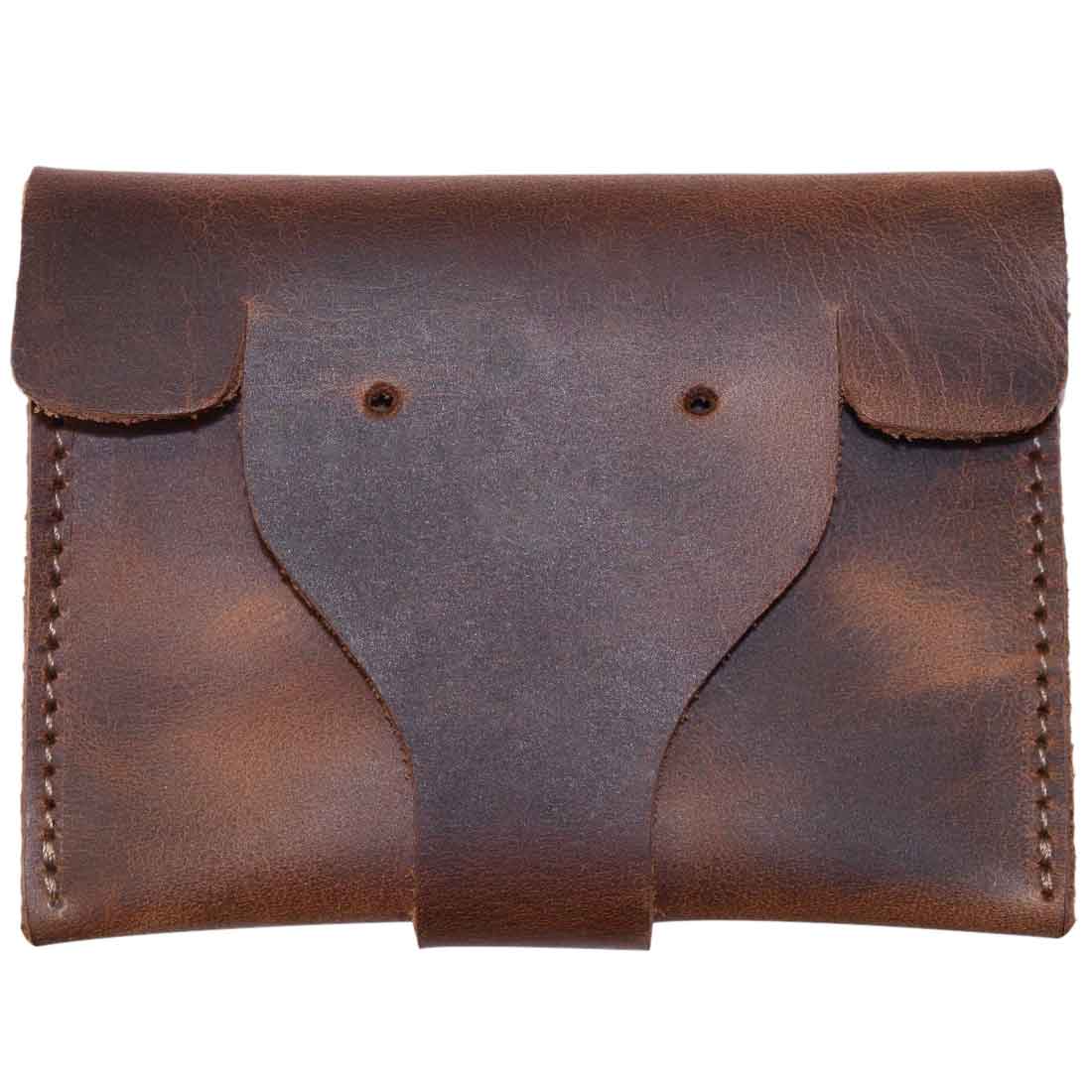 Handmade Elephant Coin Pouch by Hide & Drink, crafted from full grain leather with a rustic finish, perfect for holding coins and folded bills. Features a unique elephant design, ideal for artisans and small batch production lovers. Card Pouch Elephant/Coin & Folded Bills/Wallet/Cable Holder/USB/SD/Change, Full Grain Leather, StockyardX, Hand Cut, Hand Sewn, Fire Branded, Artisan, Handmade in La Antigua Guatemala & Oaxaca Mexico.