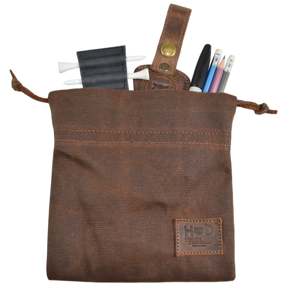 Hide & Drink Golf Pouch made from durable waxed canvas, perfect for organizing golf valuables. This handcrafted pouch features a cinch closure and is ideal for storing essentials in your golf bag. Waxed Canvas Golf Valuables Field Pouch, Golf Bag, Sport Organizer, Multipurpose Pouch with String, StockyardX, Small Batch Production, Hand Cut, Hand Sewn, Fire Branded, Artisan, Handmade in La Antigua Guatemala & Oaxaca Mexico.