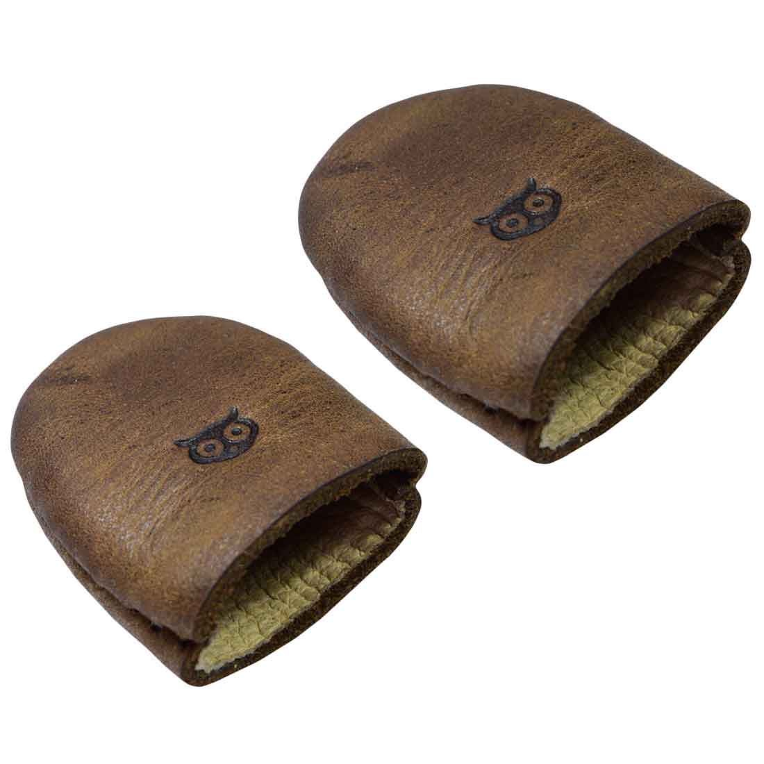 Leather Thimble by Hide & Drink, featuring a Set of 2 Thimbles that serve as Finger Protectors for sewing projects, ideal for Hand Applique & EPP and Quilting Embroidery. Made from Full Grain Leather, this artisan product showcases Small Batch Production with Hand Cut, Hand Sewn craftsmanship and is Fire Branded, perfect for handmade accessories made in La Antigua Guatemala & Oaxaca Mexico.