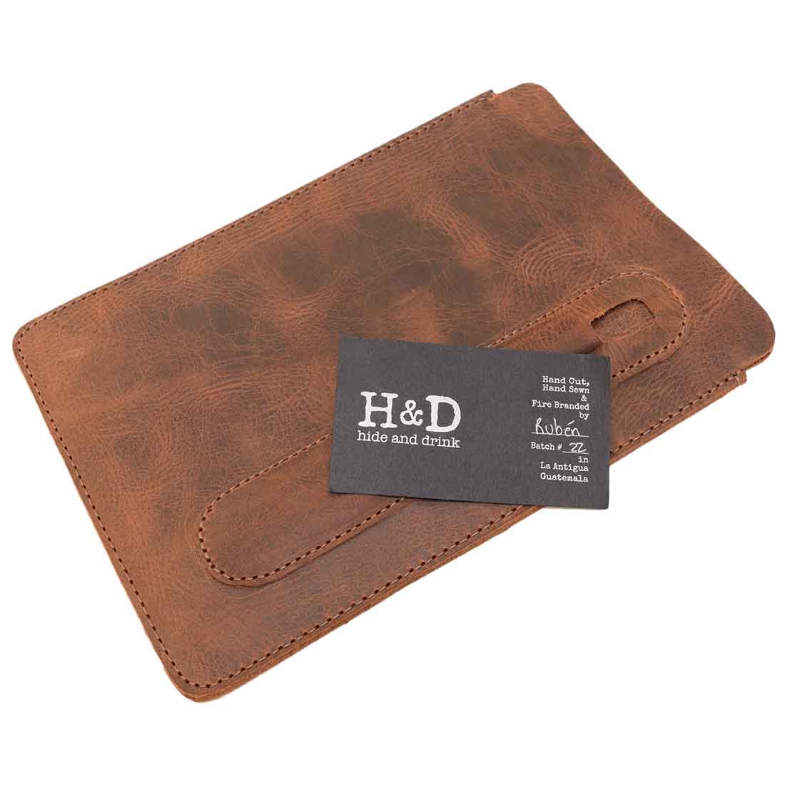Hide & Drink's Notebook Sleeve & Pen Holder (5 x 8.5 in.) (Notebook Not Included) captured with a business card, showcasing its quality full grain leather, great for use as a journal cover or diary case, handmade by artisans in La Antigua Guatemala & Oaxaca Mexico.