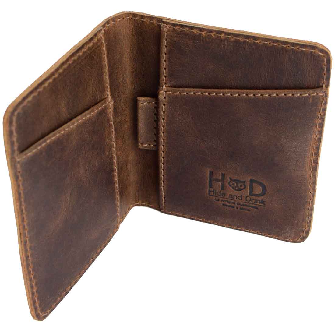 Open view of the Hide & Drink Minimalist Bi-fold Wallet showcasing its compartments for cards and cash. This handcrafted wallet is made of full grain leather and is perfect for everyday accessories, featuring a capacity to hold up to 6 cards plus folded bills. Ideal cash organizer with small batch production in La Antigua Guatemala & Oaxaca Mexico.