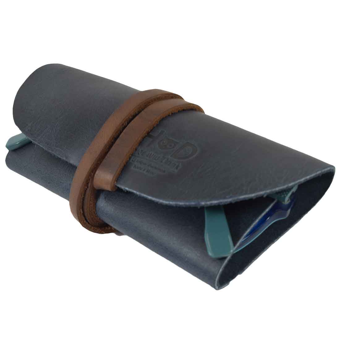 Hide & Drink Leather Sunglass Wrap, crafted from high-quality full grain leather, is perfect for on-the-go storage of your sunglasses. This artisan eye glasses storage is great for travel, hand cut and sewn in La Antigua Guatemala.