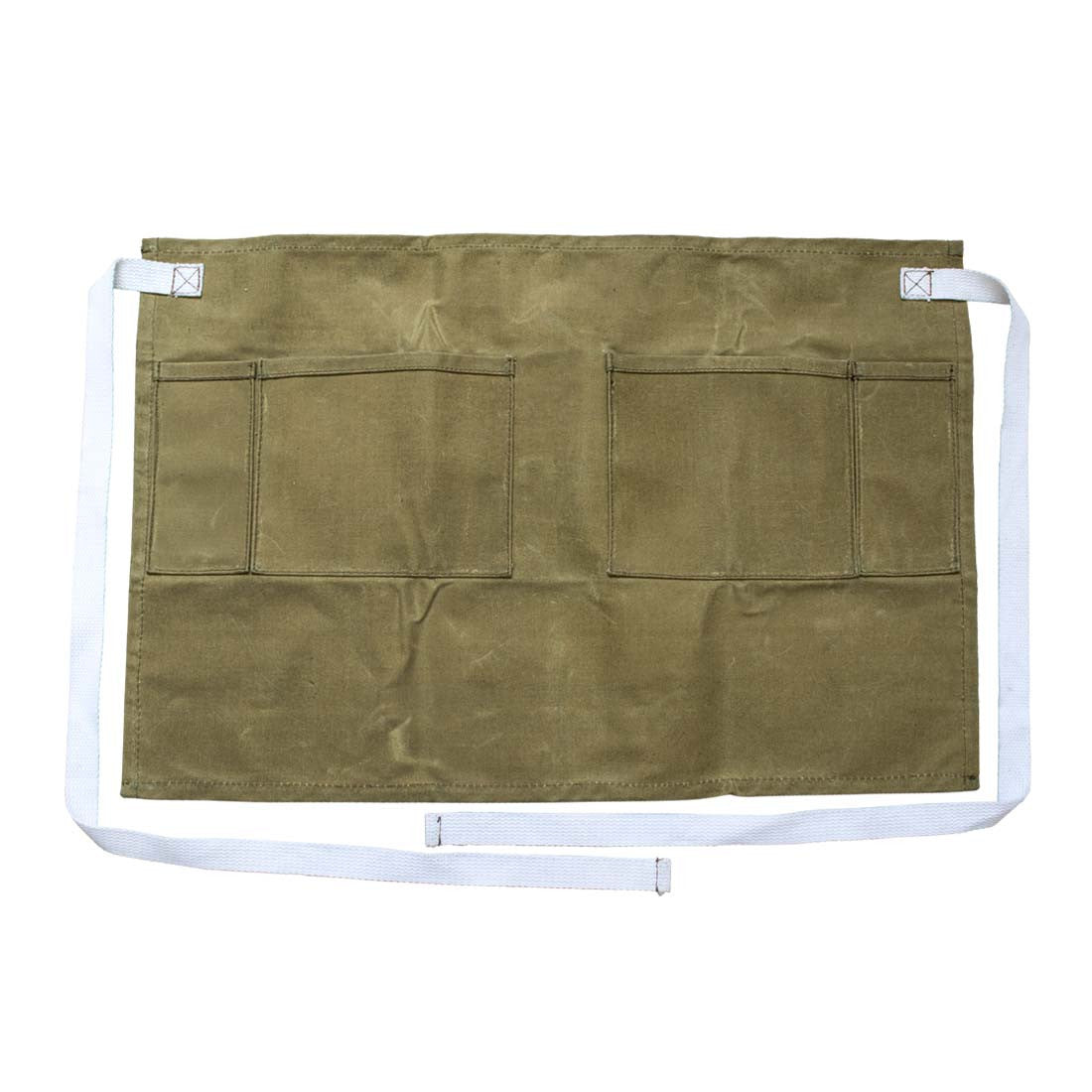 Front view of the Waxed Canvas Waist Apron by Hide & Drink, showcasing its durable water resistant material and spacious pockets. This apron is crafted through small batch production, hand cut, and hand sewn, with fire branding, reflecting the artisan quality handmade in La Antigua Guatemala & Oaxaca Mexico.